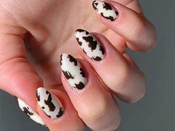 Almond Nails Designs with Cow Print