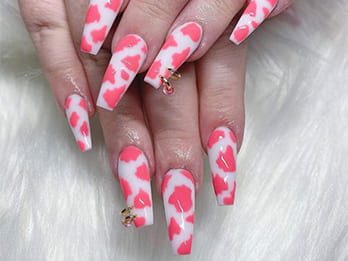 Pink and White Pastel Cow Print Nails