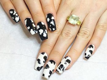Reverse Cow Print Nails