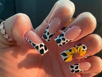 Sunflower and Cow Print Nails