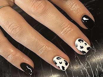 Traditional Black and White Cow Print Nails